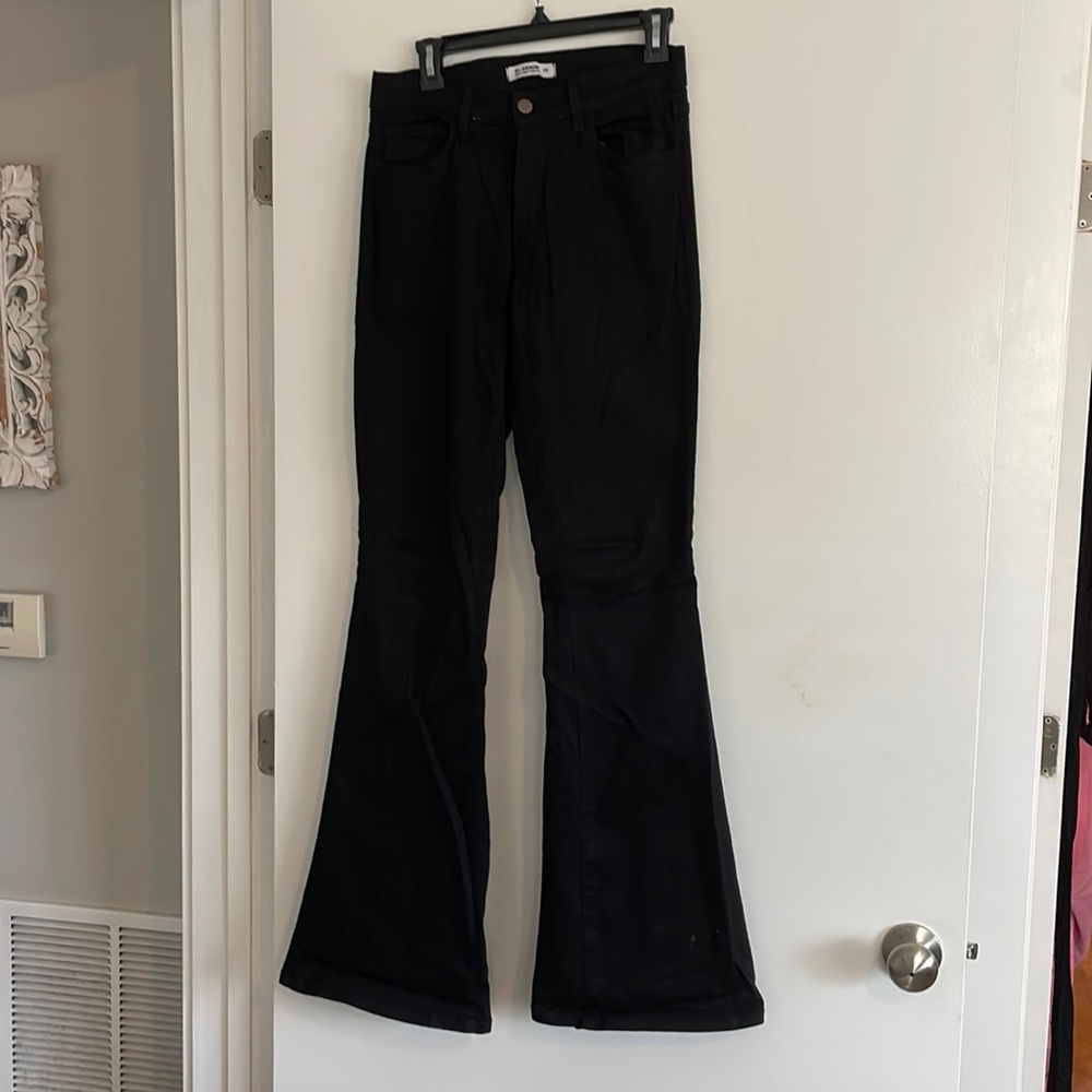 Black flared denim jeans